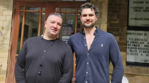 Aisha Iqbal/BBC Gypsy and Roma community worker and advocate Juice Vamosi (left) and theatre producer Javaad Alipoor