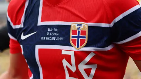 A close up of the red Norway National Team 2026 stadium jersey. 