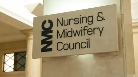 Nursing and Midwifery Council A marble block with the words Nursing and Midwifery Council written on it
