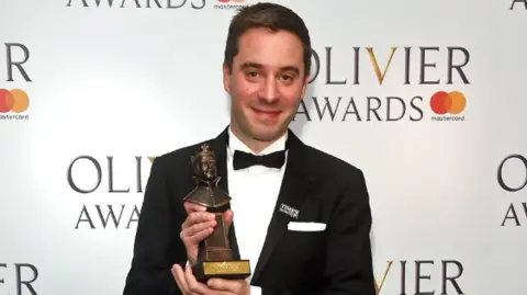 Getty Images James Graham with his Olivier Award