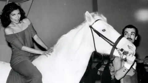 Getty Bianca Jagger rides a horse into Studio 54 in 1970s New York