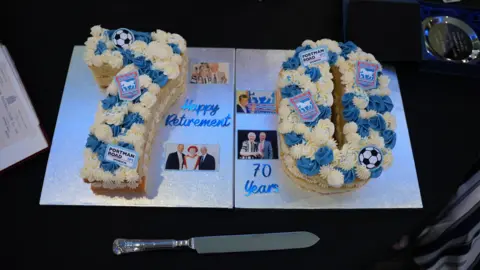 ITFC Two cakes making up the number 70 decorated by the Ipswich Town badge