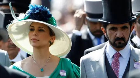 Reuters Princess Haya Bint Al-Hussein and Dubai ruler Sheikh Mohammed Al-Maktoum (file photo)