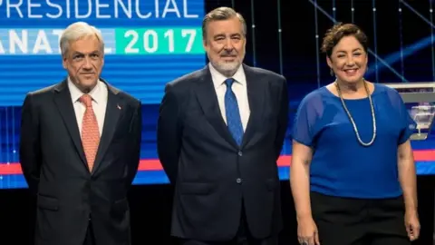 AFP Presidential candidates , Sebastian Pinera from Chile Vamos, Alejandro Guiller from the ruling party and Beatriz Sanchez from Frente Amplio party , are pictured before the presidential debate in Santiago, on November 6, 2017