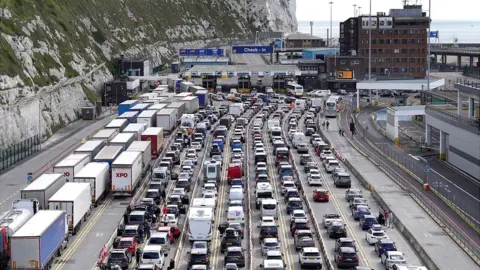 PA Media Queues at Dover on 22 July