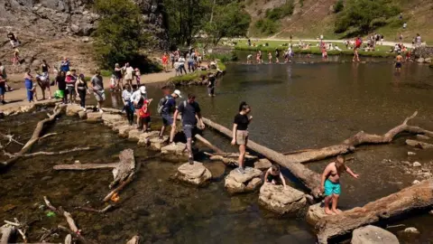 PA Media Dovedale stepping stones on a sunny day