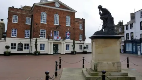 Geograph/Richard Humphrey Town Hall and war memorial, Huntingdon
