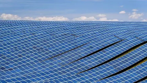 Getty Images A view shows photovoltaic solar panels at the power plant in La Colle des Mées, Alpes de Haute Provence, south eastern France, on April 17, 2019.