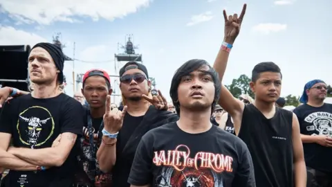 Dominik Probst Doch Chkae with their mentor, Timon, far left, at the festival