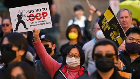 Getty Images People in Sydney gather to protest against Chinese interference and support Hong Kong protesters