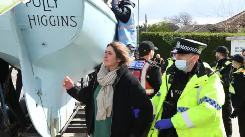 Extinction Rebellion Police and protesters at BP's Hamble oil terminal