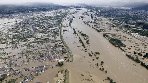 Reuters Areas flooded by the Chikuma river following Typhoon Hagibis in Nagano, central Japan, October 13, 2019