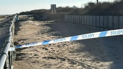 Police cordon on one of the beaches