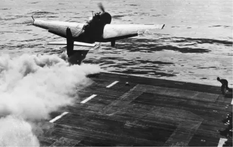Alamy A Grumann TBF Avenger makes a jet-assisted take-off in the Pacific in World War Two