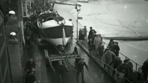 St Ives Museum Lifeboat being pulled through streets