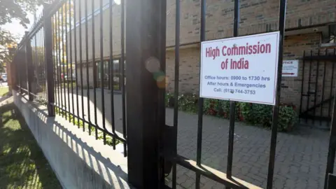 Getty Images The entrance gate of the High Commission of India is pictured on October 3, 2023 in Ottawa, Canada.  Canada sought to maintain its full diplomatic presence in India on Tuesday, after New Delhi reportedly ordered Ottawa to withdraw 40 diplomats in a dispute over the assassination of a Sikh separatist.