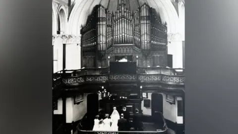 family photo Inside Bethany Chapel on Marian Quinney's wedding day