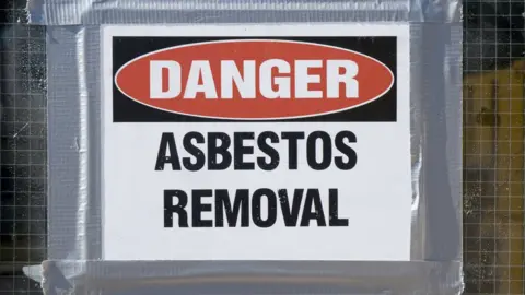 Thinkstock A picture of danger asbestos removal sign