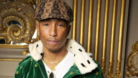 Pharrell Williams at Louis Vuitton Fall 2023 Ready To Wear Runway Show on March 6, 2023 at the Musee dOrsay in Paris, France