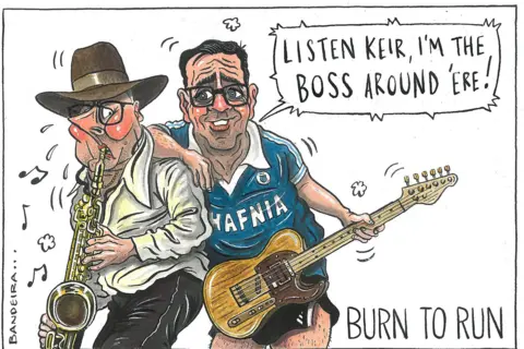 Graeme Bandeira/Northern Agenda A satirical political cartoon depicting Sir Keir Starmer and Andy Burnham performing together, with Burnham playing a guitar and asserting authority and Sir Keir playing a saxophone looking nervous. The title says: "Burn to Run" with Burnham quoted a saying: "Listen Keir, I'm the boss around 'ere"