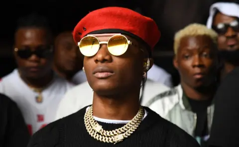 Getty Images Wizkid backstage ahead of his performance during the Global Citizen Festival: Mandela 100 at FNB Stadium in Johannesburg, South Africa - Sunday 2 December 2018