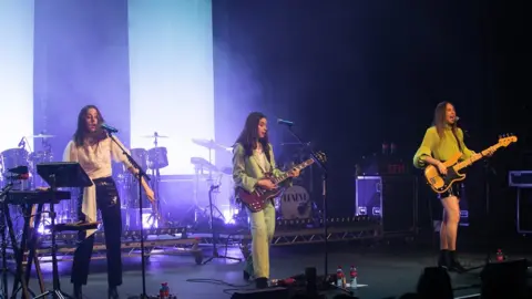 Getty Images Haim on stage