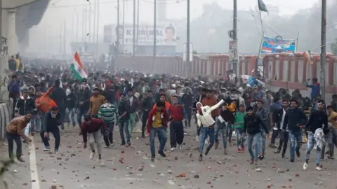 Reuters Demonstrators attend a protest against a new citizenship law in Seelampur, Delhi