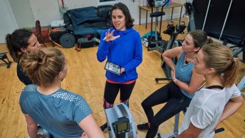 Christian Banfield Baz Moffatt with female athletes