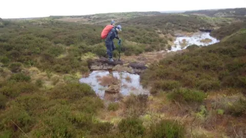 RSPB Volunteers working on peat dam pools