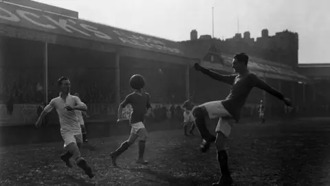 E. Bacon/Getty IMages Swansea playing Arsenal at the Vetch in 1926