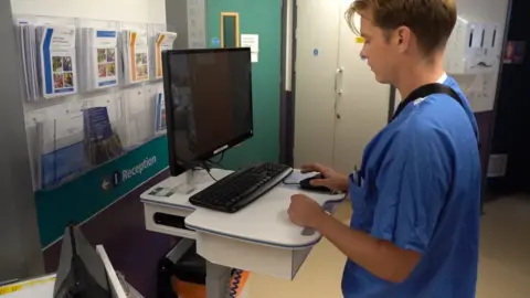 RCHT Medical worker at computer
