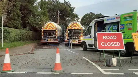 BBC A road closed for water supply work