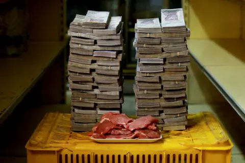 Reuters A kilogram of meat next to 9,500,000 bolivars