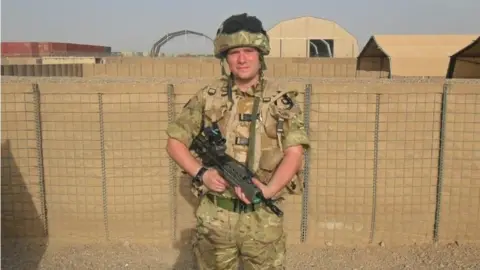 Pete White Pete when he worked in the military, in his uniform