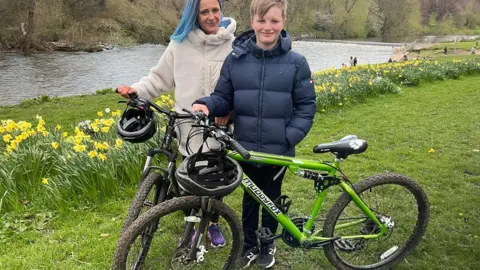 BBC Charlie and his mum Kimberley with their bikes