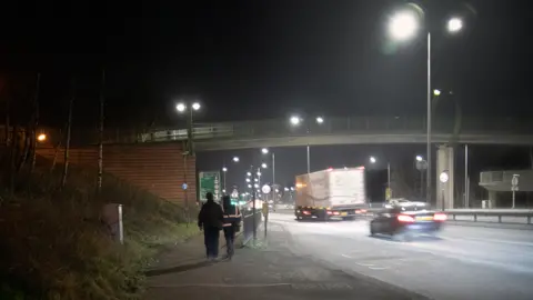 Michael walking home with a colleague