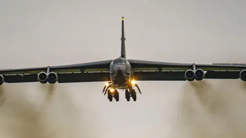 PA Media Large bomber aircraft landing at RAF Fairford in Gloucestershire back in 2022