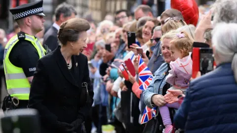 PA Media The Princess Royal speaks to crowds in Glasgow