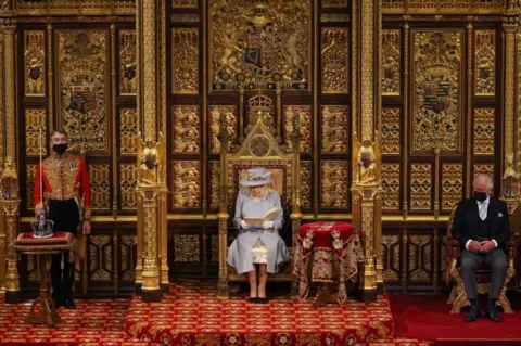 Chris Jackson / Getty Images Queen Elizabeth II reads the Queen's Speech on the The Sovereign's Throne in the House of Lords chamber, during the State Opening of Parliament at the Houses of Parliament in London on 11 May 2021.