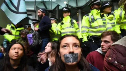 PA Media Police and Extinction Rebellion protestors
