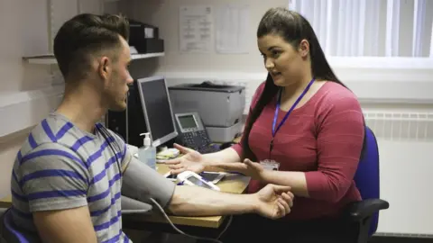 Man in a GP surgery