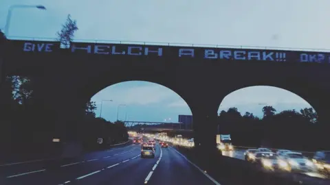 Gareth Jones The bridge with the new "Give Helch a break!!!" graffiti on the side