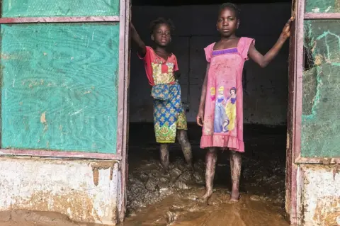 EPA A view on destroyed house after Tropical Storm Ana hit the district of Tete, Mozambique, 27 January 2022