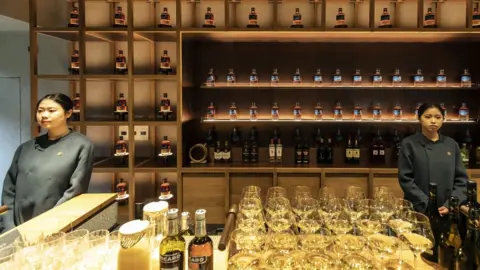 Bottles of whiskey in the Pernod Ricard Chuan Malt Whiskey Distillery shop in Emei Shan, Sichuan Province, China.