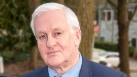 IOM GOV Andrew Foster