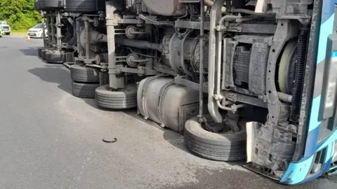 A lorry on its side