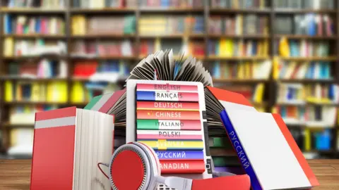 NosUA/Getty Images Language textbooks in a library