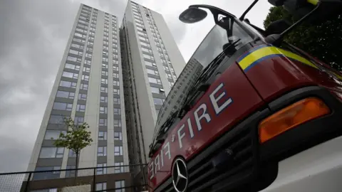 Reuters A fire engine outside a tower block in Camden