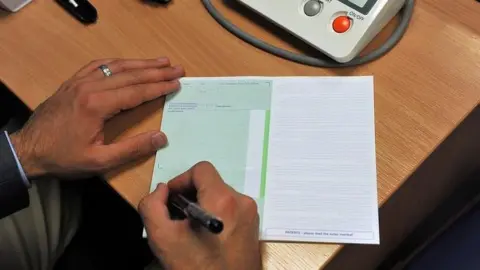 BBC GP writing prescription
