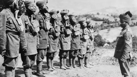 IWM A group of Indian soldiers doing gas mask training